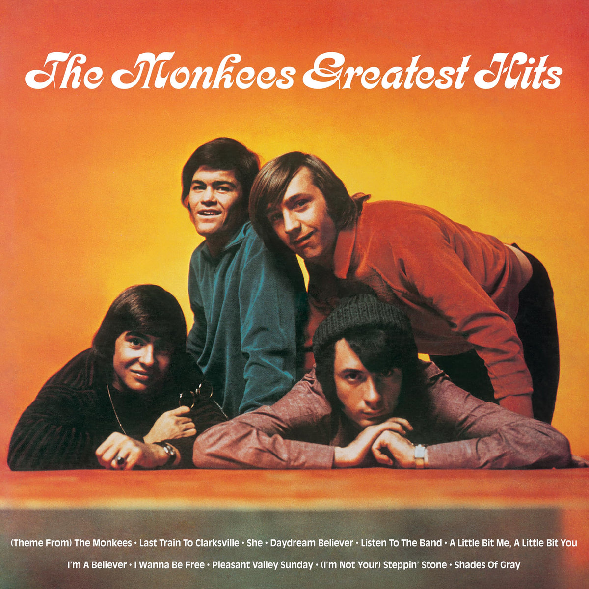 The Monkees – Greatest Hits (Yellow) by Monkees,The vinyl record cover