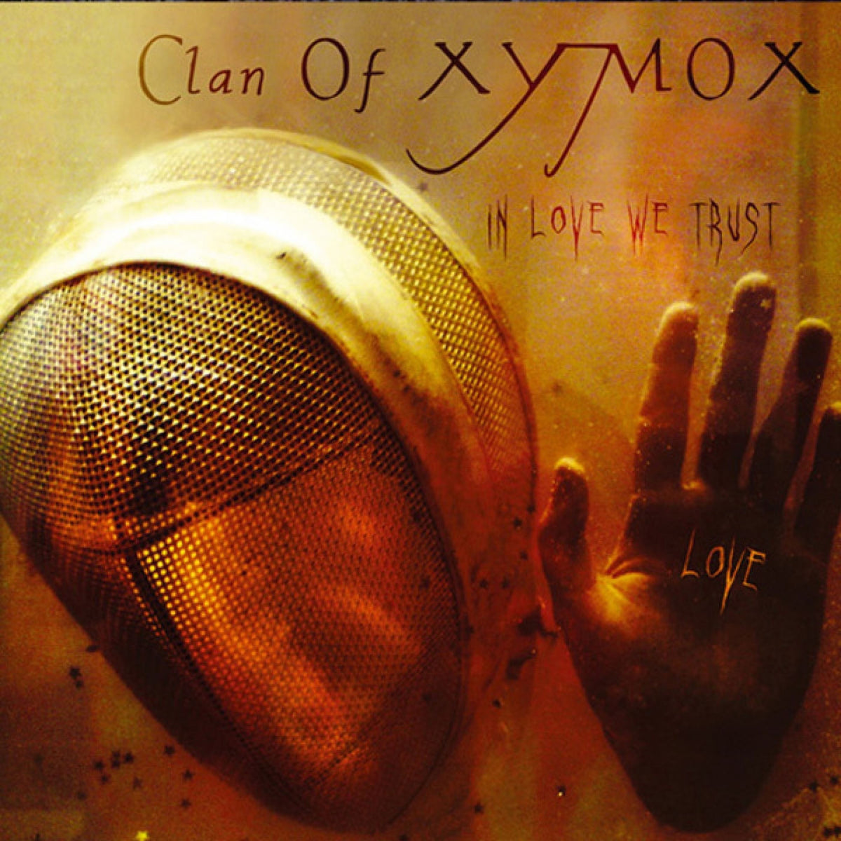 Clan Of Xymox – In Love We Trust (BLACK/ORANGE SPLATTER VINYL) vinyl record cover