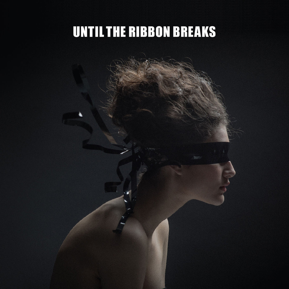Until The Ribbon Breaks – A Lesson Unlearnt vinyl record cover