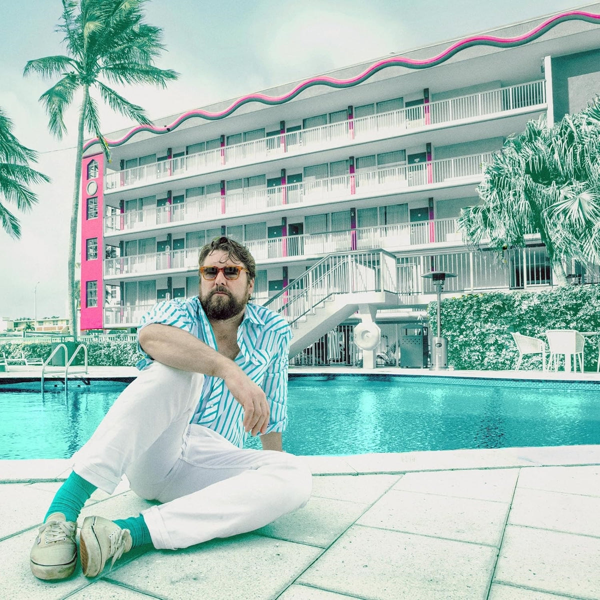 Ewan Currie – Strange Vacation Indie Exclusive Vinyl (Limited Edition Aquamarine) by Ewan Currie [LP] vinyl record cover