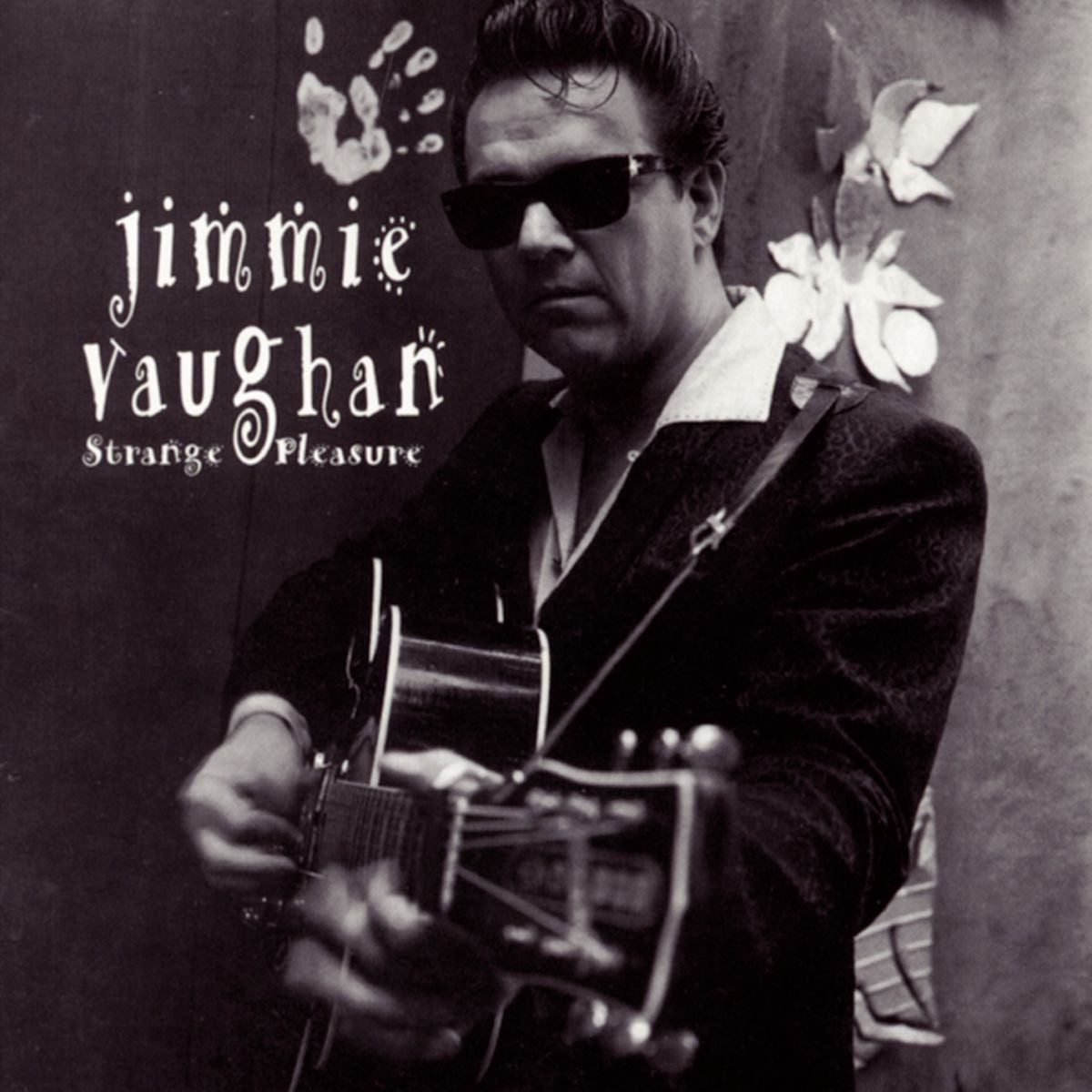 Jimmie Vaughan – Strange Pleasure vinyl record cover